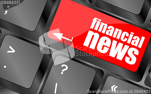 Image of financial news button on computer keyboard