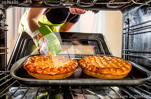Image of Cooking in the oven at home.
