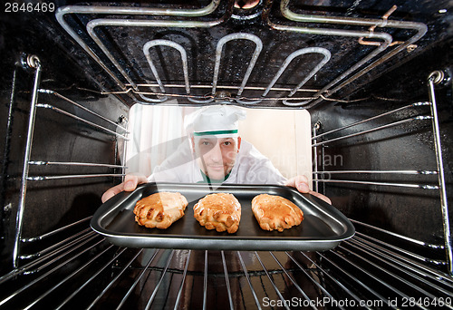 Image of Chef cooking in the oven.