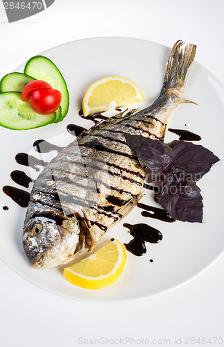 Image of Dorado roast fish on the white