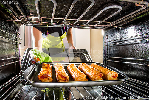 Image of Cooking in the oven at home.