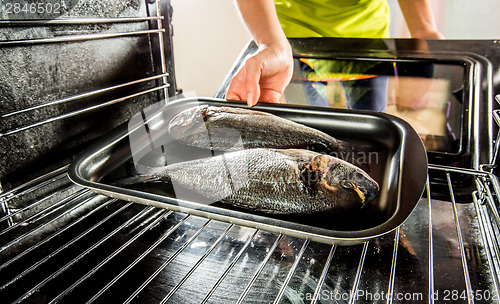 Image of Cooking Dorado fish in the oven.