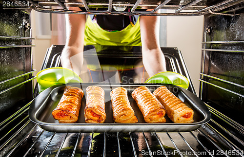 Image of Cooking in the oven at home.