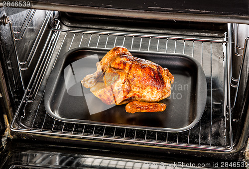 Image of Roast chicken in the oven.