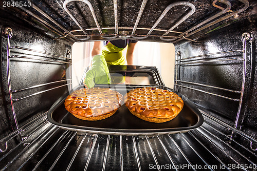 Image of Cooking in the oven at home.