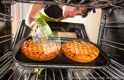 Image of Cooking in the oven at home.