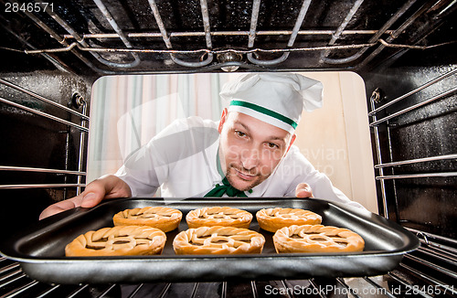 Image of Chef cooking in the oven.