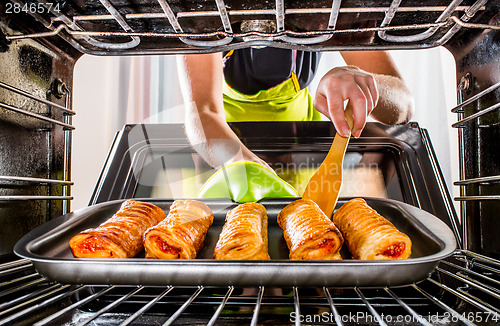 Image of Cooking in the oven at home.