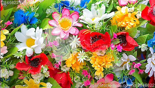 Image of Background of artificial flowers.