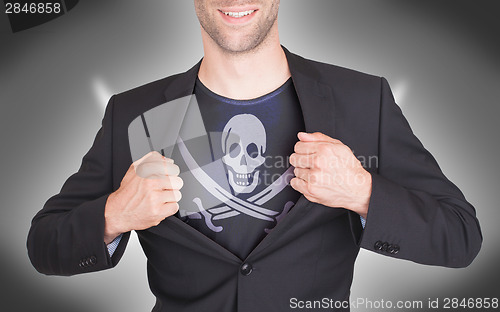 Image of Businessman opening suit to reveal shirt with flag