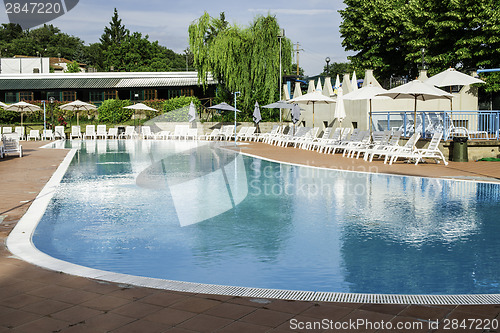 Image of Pool and sun loungers