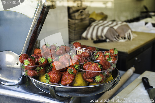 Image of Bakery in Italy. Bowl of strawberries