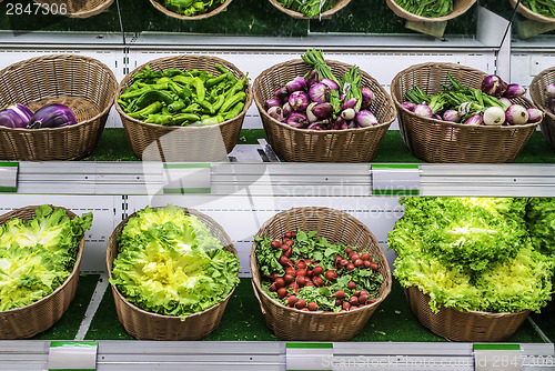 Image of Fruits and vegetables on a supermarket shelf