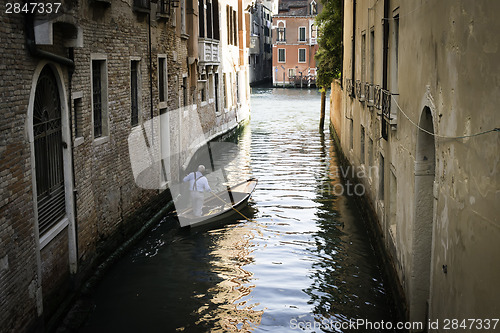 Image of Man on a boat in Venice