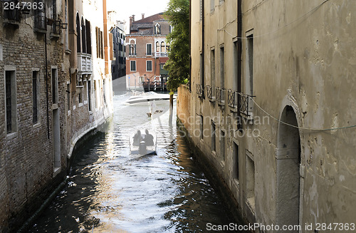 Image of Man on a boat in Venice