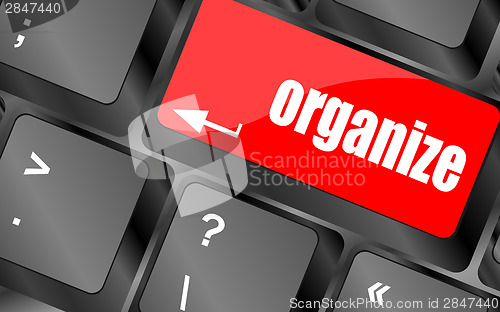 Image of word organize on computer keyboard key,