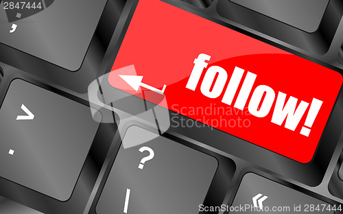Image of Social media or social network concept: Keyboard with follow button