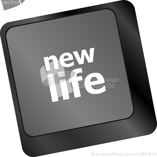 Image of black keyboard keys with new life words