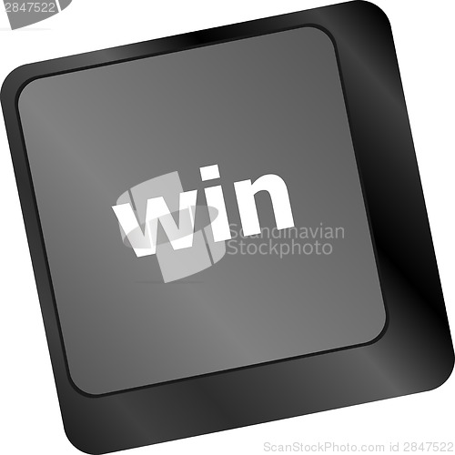 Image of win word on computer keyboard key button