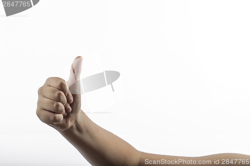 Image of Young hand make hitchhiking gesture