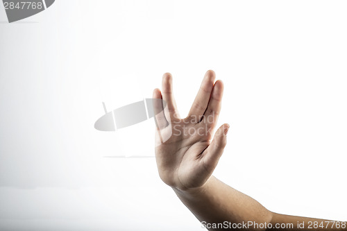 Image of Young hands make Vulcan Salute