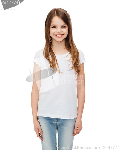 Image of smiling little girl in white blank t-shirt