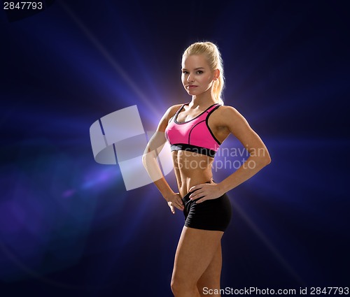 Image of beautiful athletic woman in sportswear