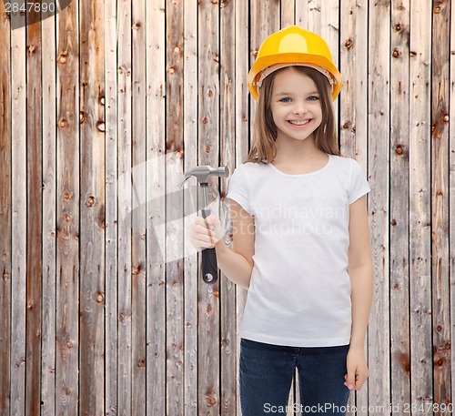 Image of smiling little girl in protective helmet