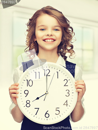 Image of girl with big clock