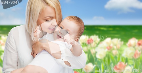 Image of happy mother with smiling baby