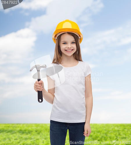 Image of smiling little girl in protective helmet