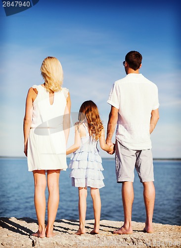 Image of happy family at the seaside