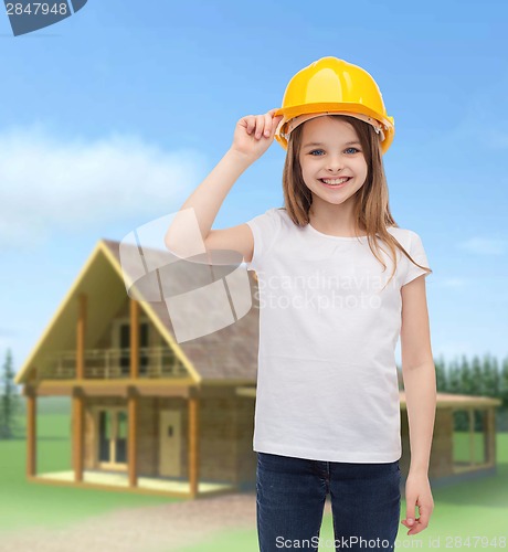 Image of smiling little girl in protective helmet