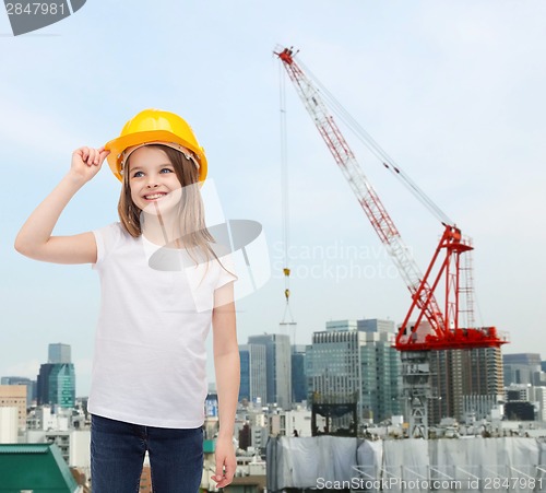 Image of smiling little girl in protective helmet