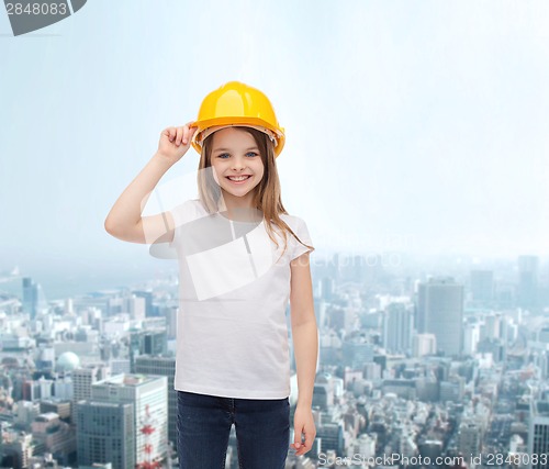 Image of smiling little girl in protective helmet