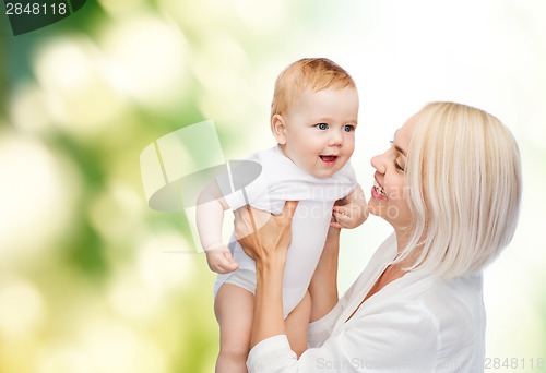 Image of happy mother with smiling baby