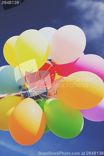 Image of lots of colorful balloons in the sky