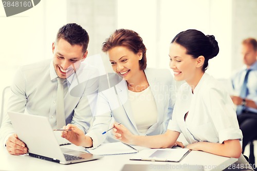 Image of business team having discussion in office