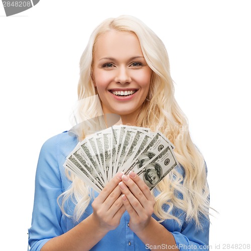 Image of smiling girl with dollar cash money