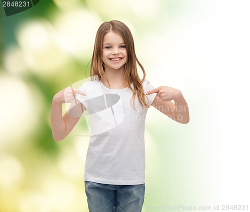 Image of smiling little girl in blank white t-shirt