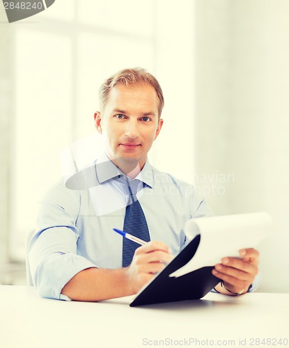 Image of businessman taking employment inteview