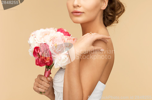 Image of woman with bouquet of flowers