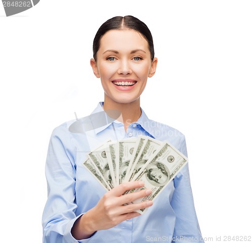 Image of businesswoman with dollar cash money