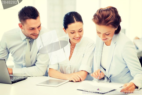 Image of business team working in office