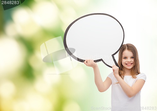 Image of smiling little girl with blank text bubble