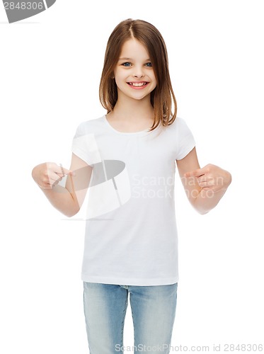 Image of smiling little girl in blank white t-shirt