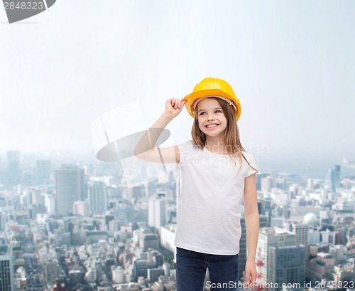 Image of smiling little girl in protective helmet