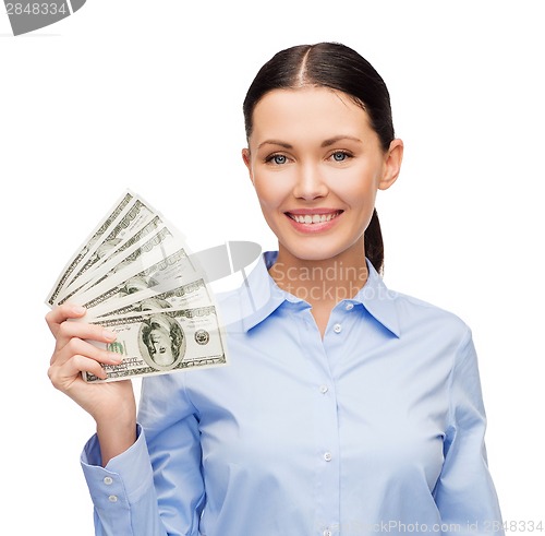 Image of businesswoman with dollar cash money