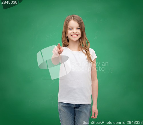 Image of little girl in blank white t-shirt pointing at you