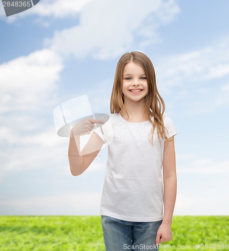 Image of smiling little girl in blank white t-shirt